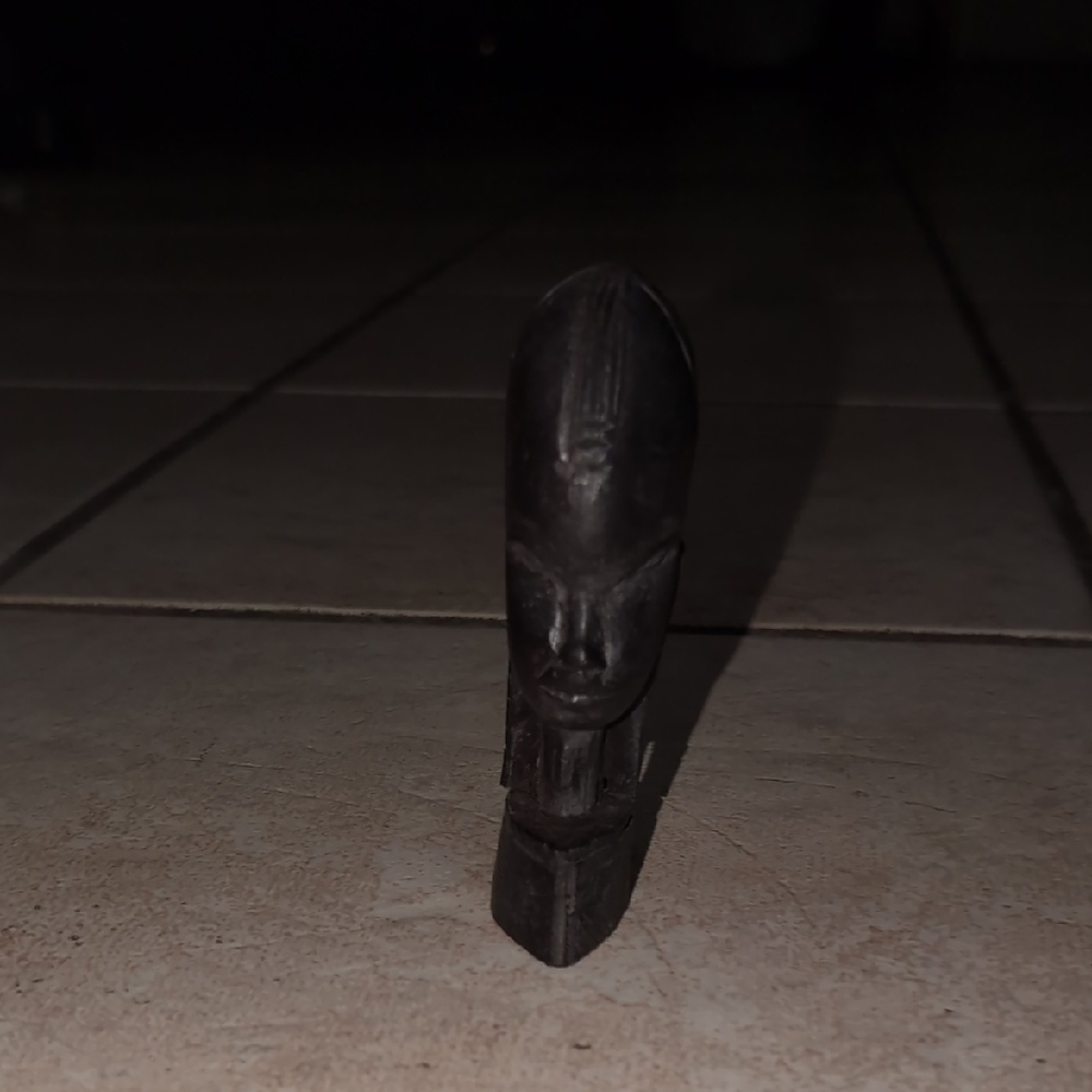 Dark Wooden Carved Figurine